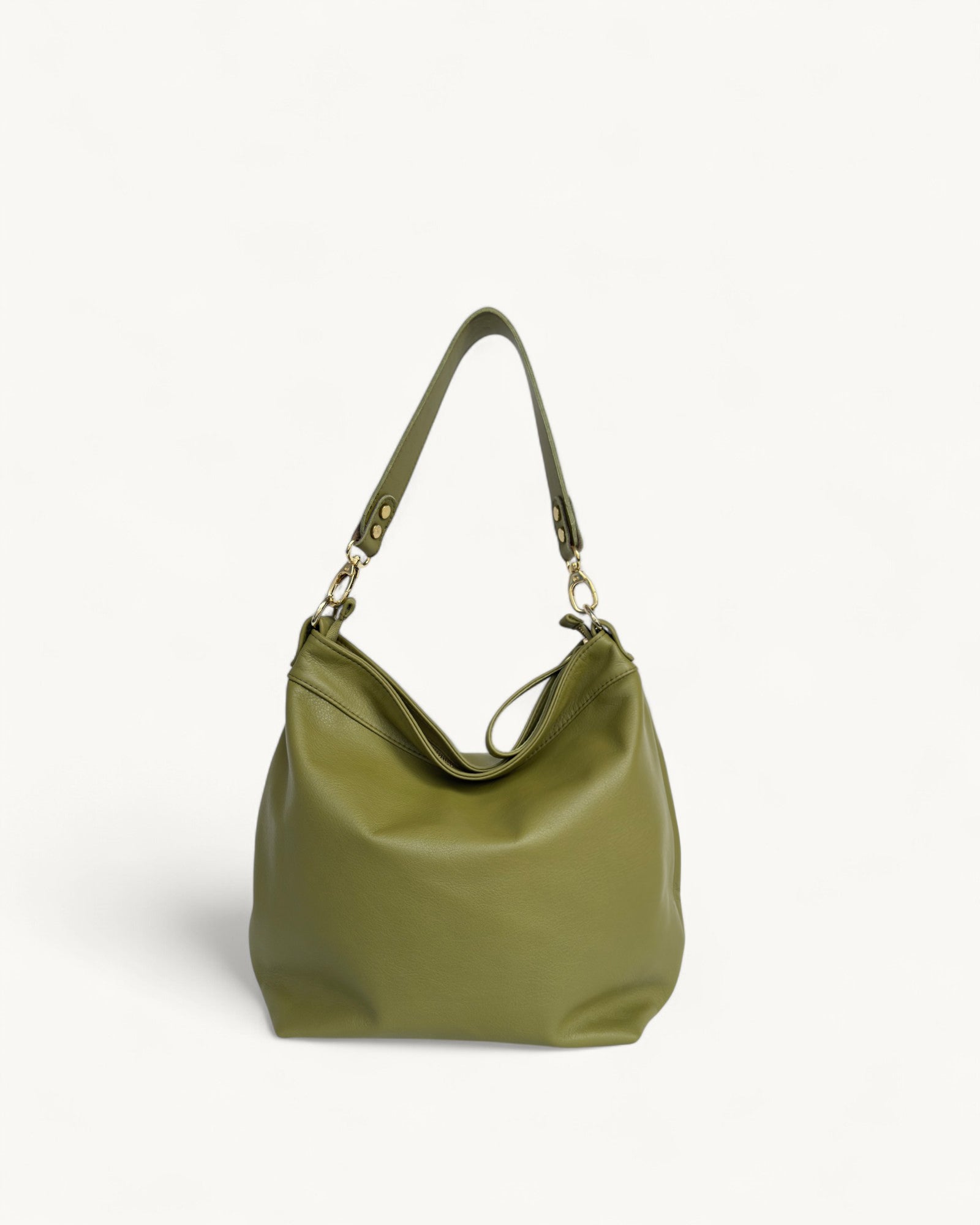 Green handbag on a white background