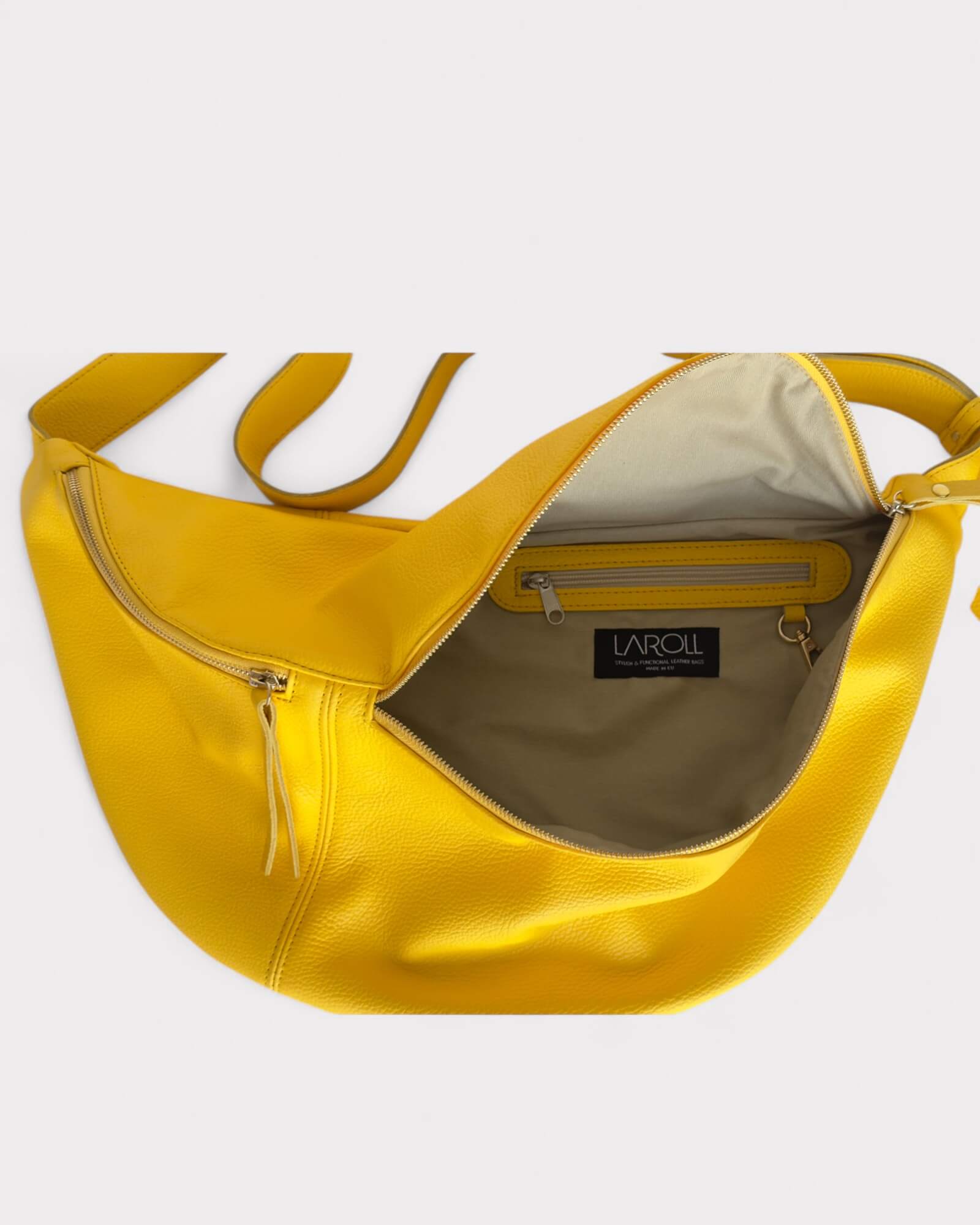 Yellow handbag lining photo with visible brand logo on a light gray background