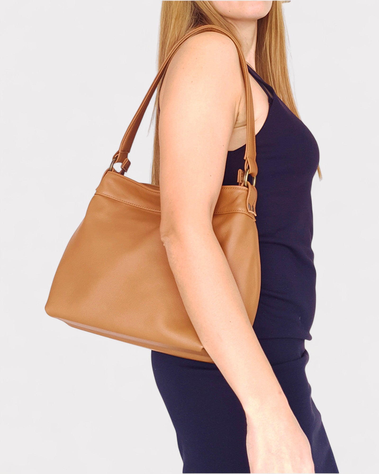 person wearing the tan small hobo bag