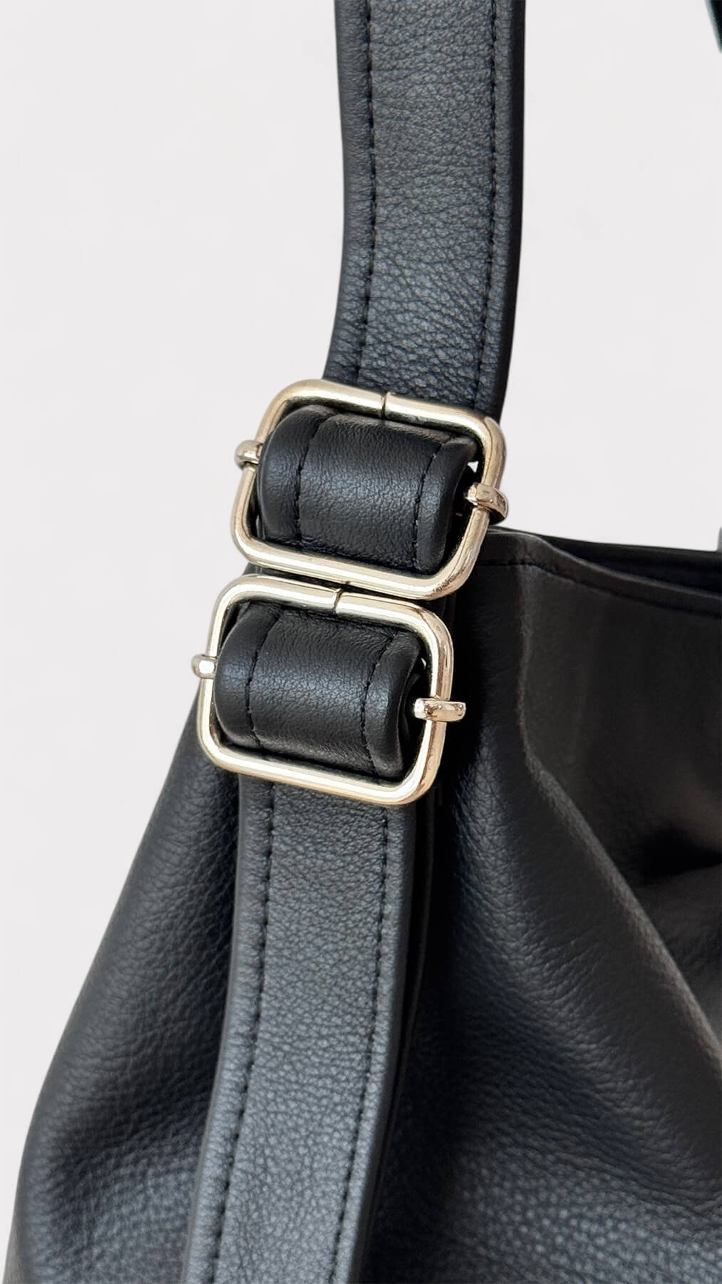 Close-up of a black leather bag 