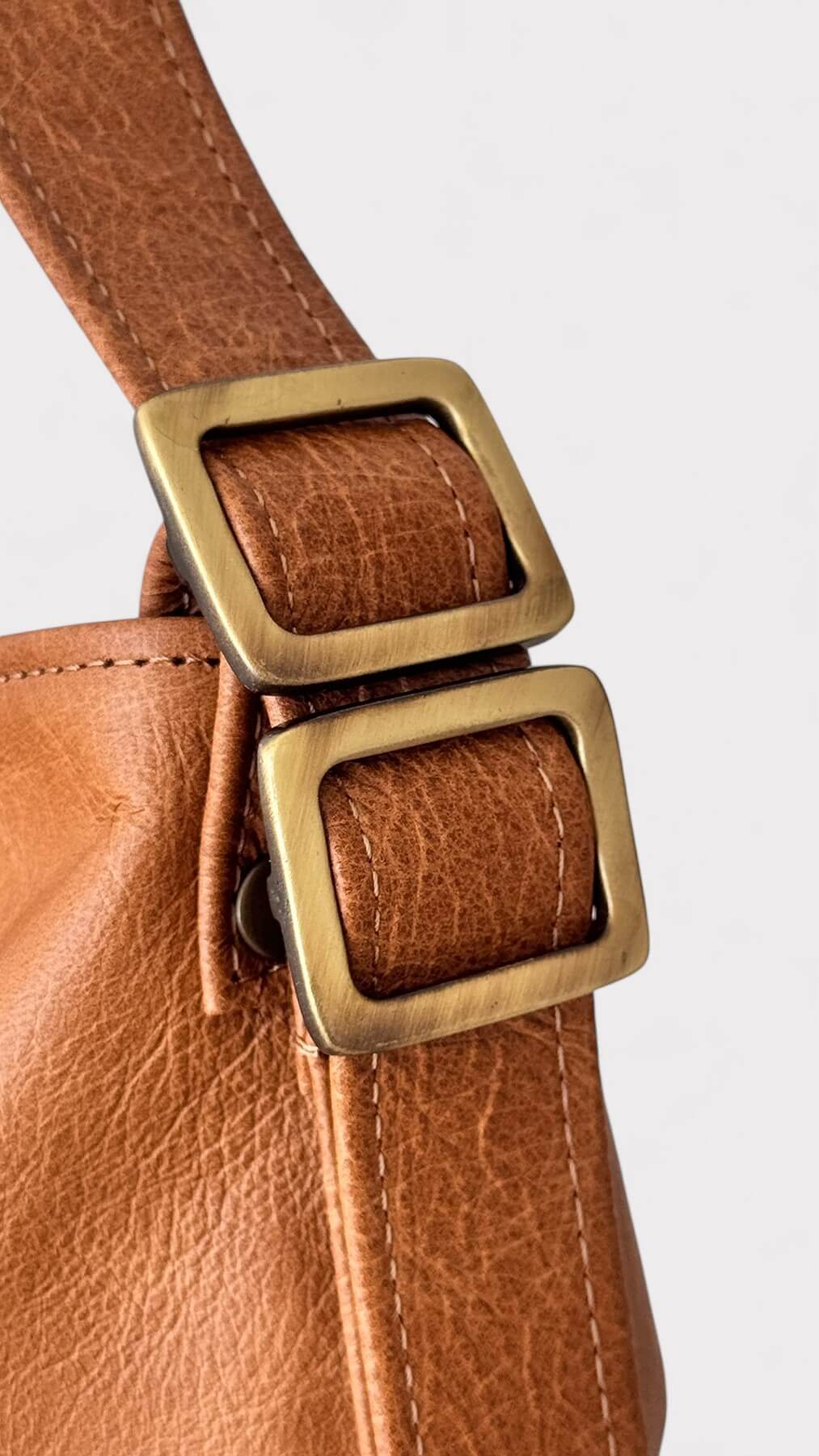 Close-up of a tan leather bag 