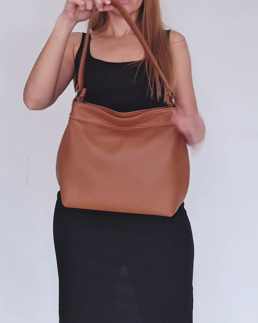 video of small tan hobo bag