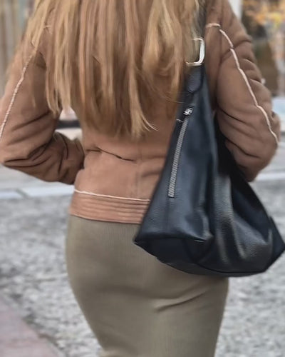 video of black leather shoulder bag