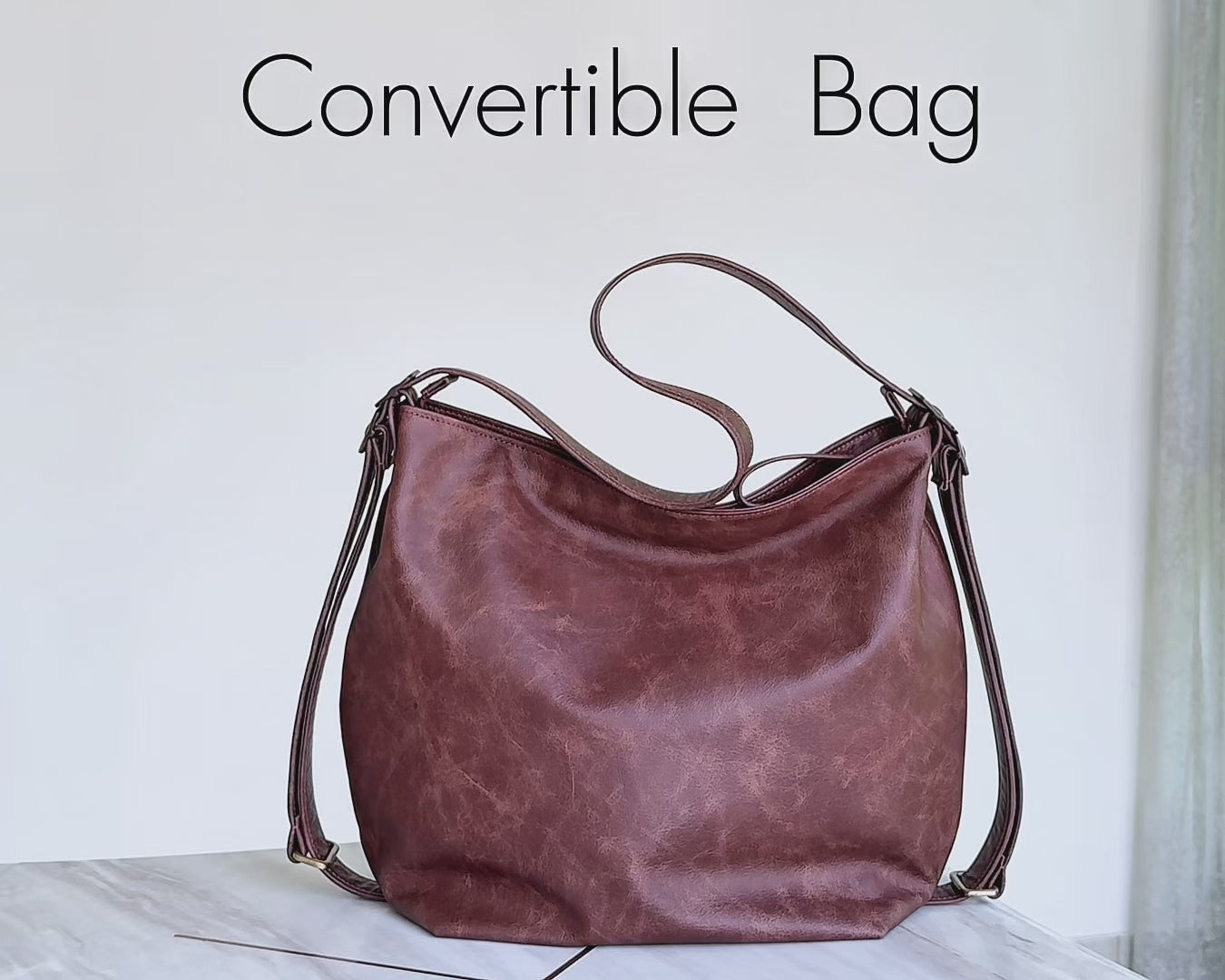 video of brown convertible hobo bag