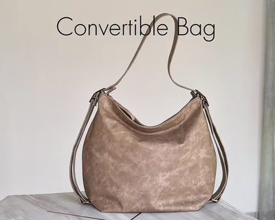 video of beige convertible hobo bag