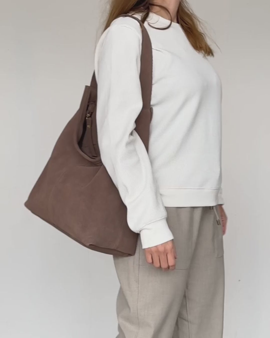 video of taupe suede athina bag