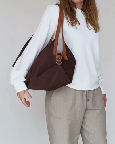 video of dark brown suede deluna bag