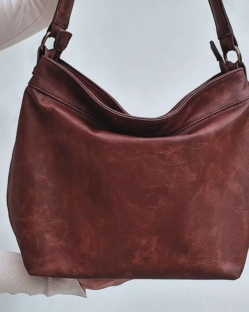video of brown distressed leather medium size