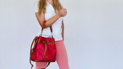 video of red bucket bag