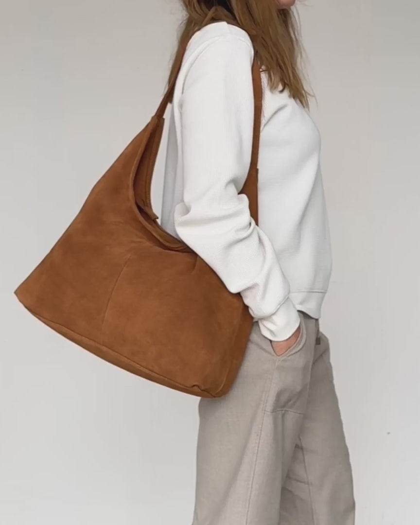 video of tan suede athina bag